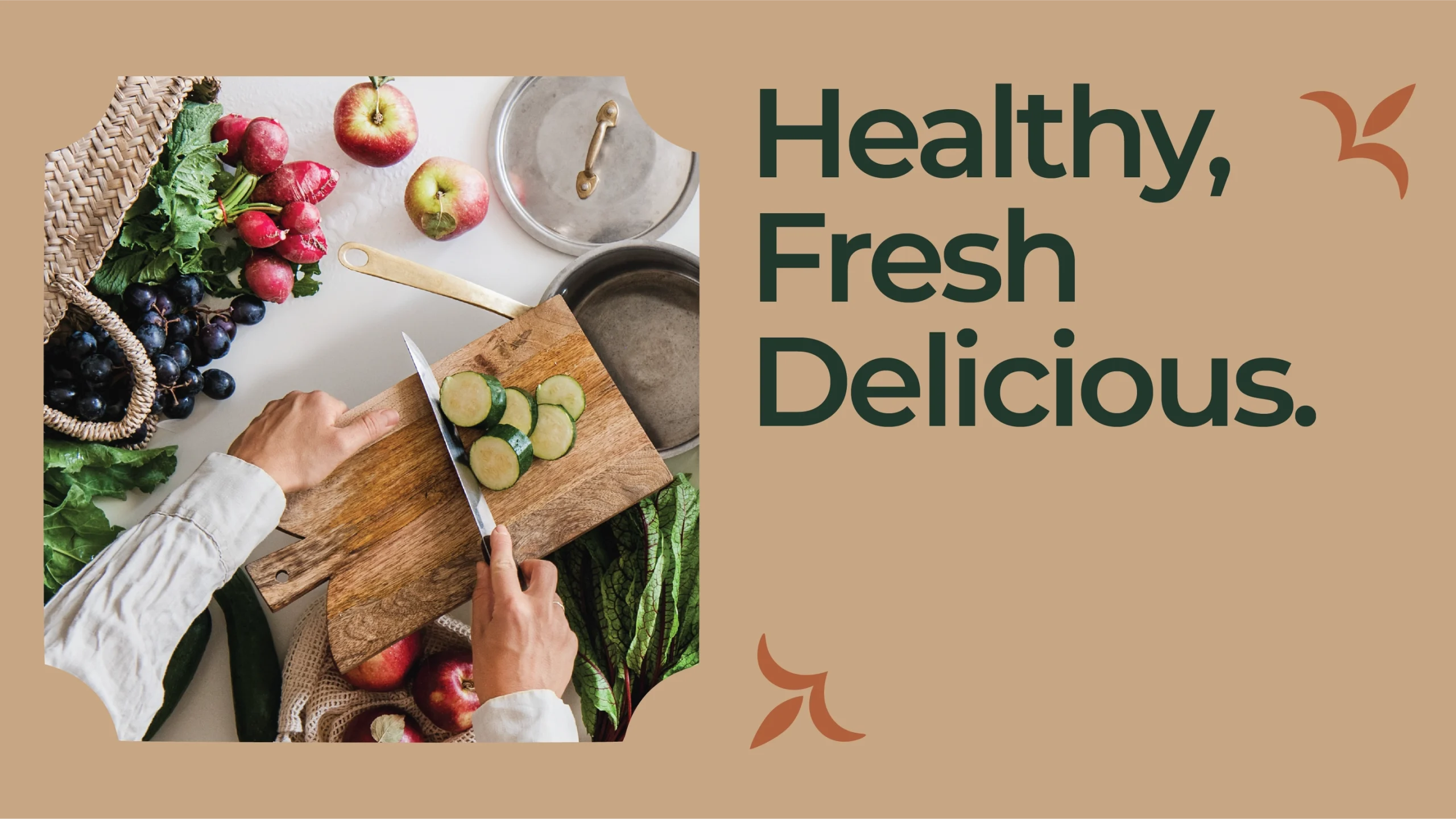 Top-down view of hands slicing cucumbers on a wooden cutting board surrounded by fresh fruits and vegetables, promoting healthy cooking.